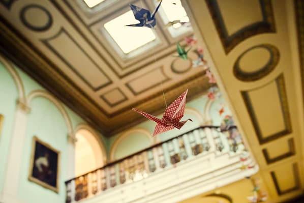 Paper birds decorating the vestibule for a wedding at Temple House