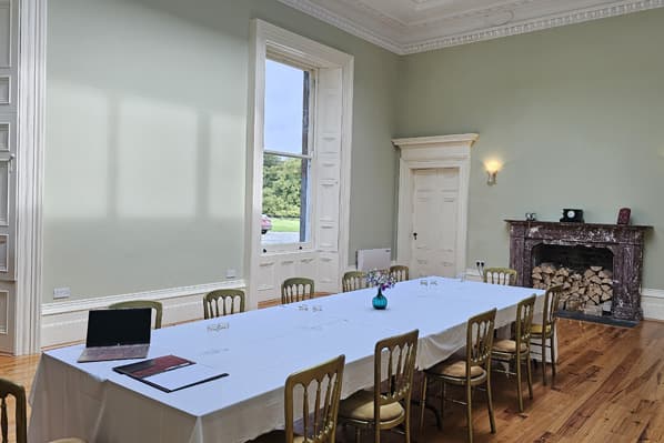 A corporate meeting set up in the grand rooms of Temple House