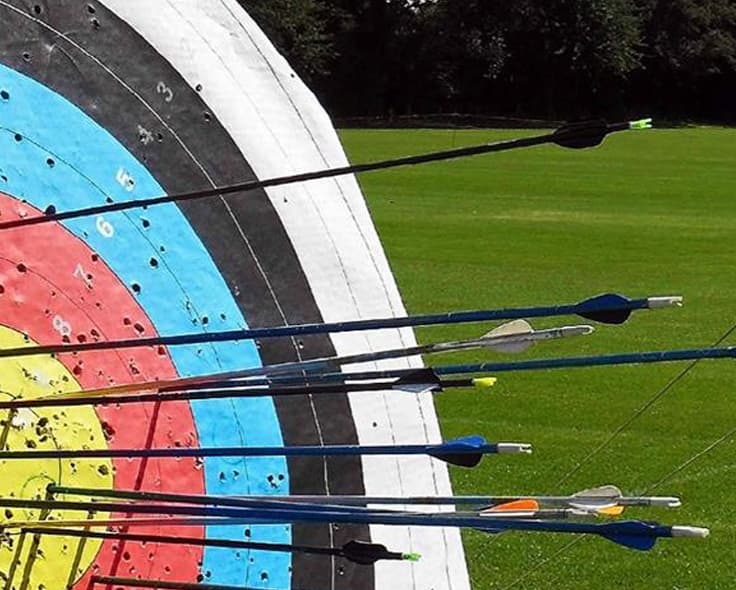 Soft archery team building on the lawn at Temple House