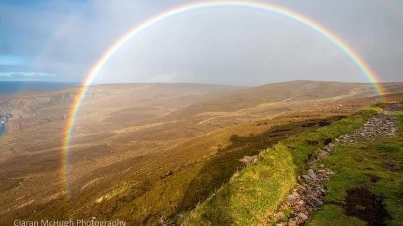 A rainbow over the Irish landscape, photographed by Ciaran McHugh
