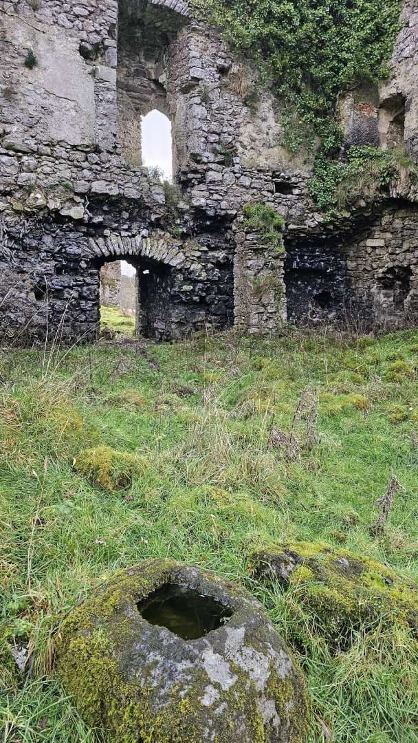Stone cross base, dated stylistically pre-1200, in the Temple House castle ruins