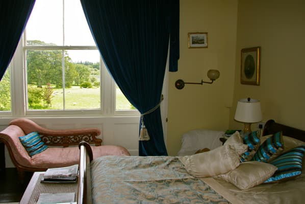 The Blue Room bedroom at Temple House — elegant accommodation for flexible stays