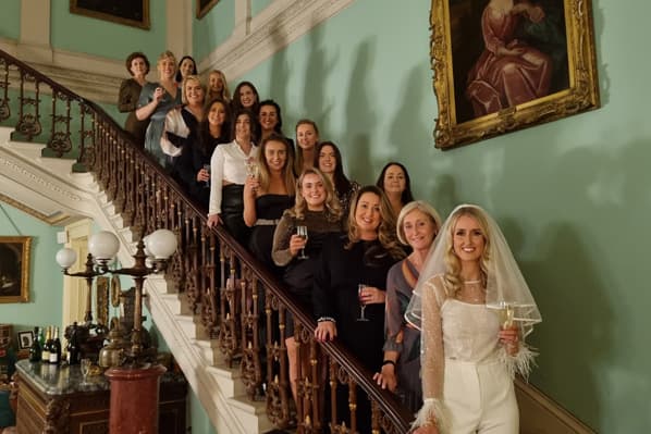 Hen party on the grand staircase at Temple House in County Sligo