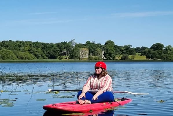 Paddle boarding on the lake at Temple House