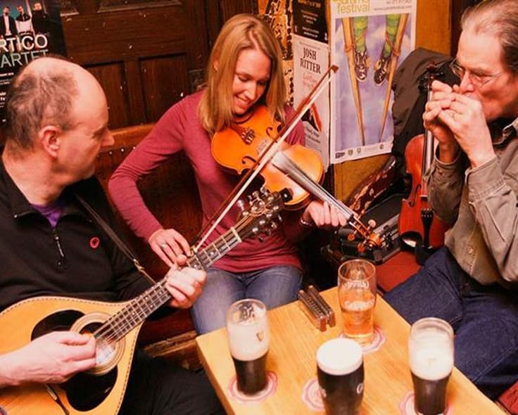 Traditional Irish music session in a South Sligo pub — fiddle, flute and bodhrán