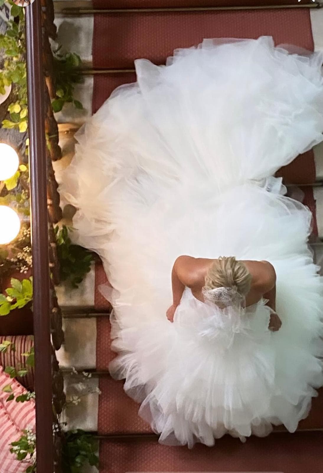 Bride going down the grand staircase at Temple House