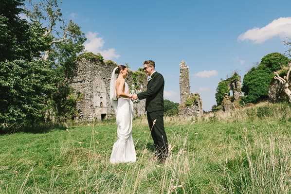 Wedding couple in front of the Temple House castle