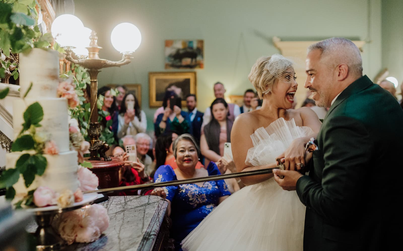 Wedding couple cutting the wedding cake at Temple House, Sligo