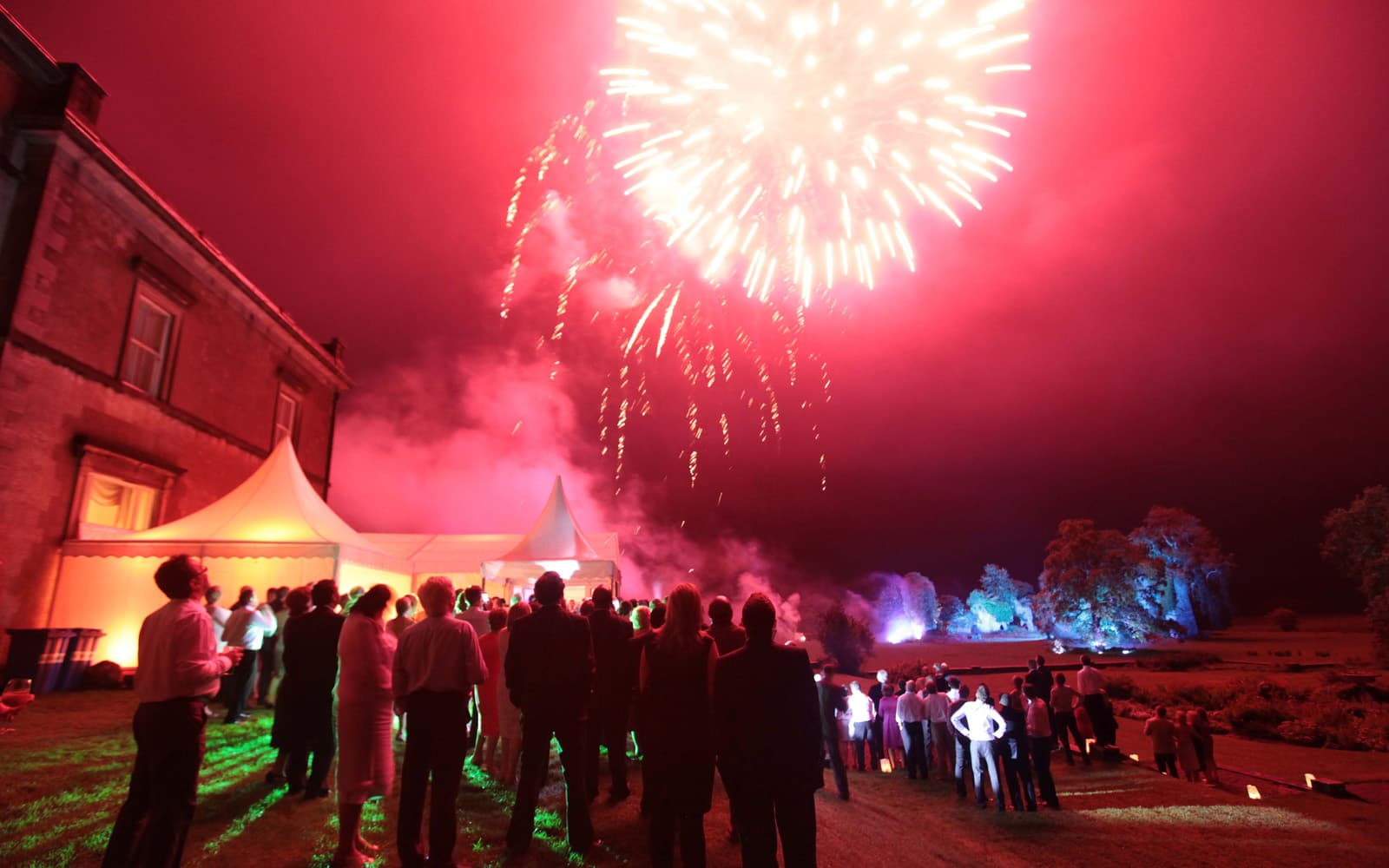 Wedding fireworks red sky at Temple House
